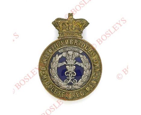 Badge. DCO Middlesex Regiment Victorian Officer’s glengarry badge. A fine scarce gilt crowned circlet inscribed ‘Duke of Camb