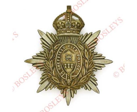 Badge. Sheffield City Police senior Officer’s helmet plate. Die-stamped white metal crowned star mounted with wreath, strap a
