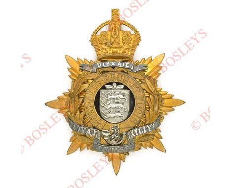 Badge. 2nd Royal Guernsey Militia Edwardian Officer’s helmet plate circa 1902-08 A scarce gilt example converted from a Victo