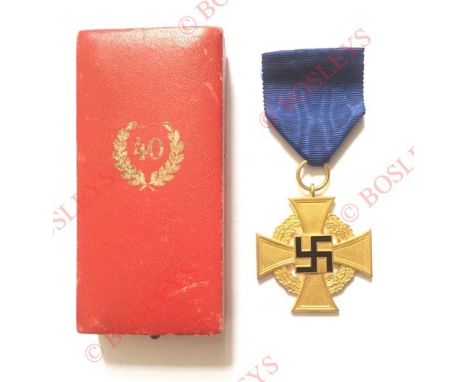 German Third Reich 1st Class Faithful Service Decoration in case of issue. A fine gilt example with black enamel swastika on 