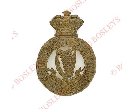 Irish. Connaught Rangers Victorian OR’s glengarry badge circa 1881-96. A good die-stamped brass example. Crowned circlet insc