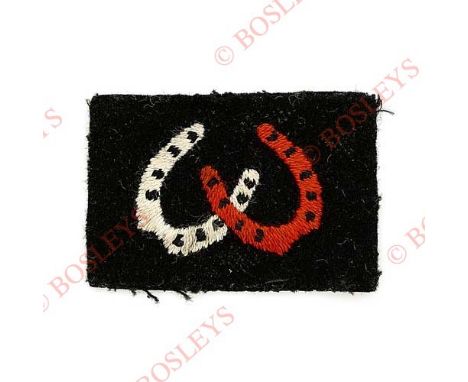 Badge. 4 Pack Group Royal Army Service Corps WW2 cloth formation sign. A rare example. Interlocking slanted white and red hor