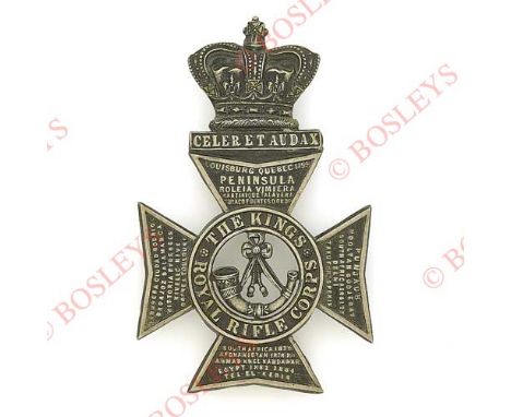 Badge. King’s Royal Rifle Corps Victorian Officer’s helmet plate circa 1883-93. A good die-stamped blackened example with bur