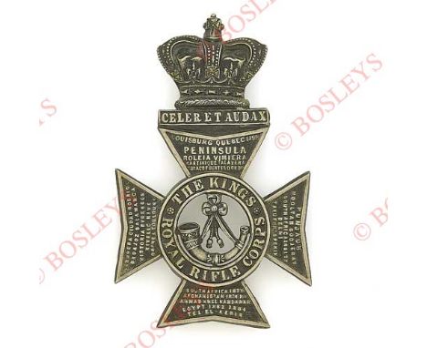 Badge. King’s Royal Rifle Corps Victorian Officer’s helmet plate circa 1883-93. A good die-stamped blackened example with bur