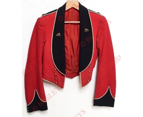 Royal Berkshire Regiment Officer’s Mess Jacket. A rare example of the post 1902 roll collar pattern, double-breasted scarlet 