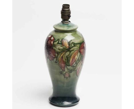 MOORCROFT 'HIBISCUS' PATTERN TABLE LAMP
decorated with tube-lined designs in pale red and yellow on a green ground, incised f