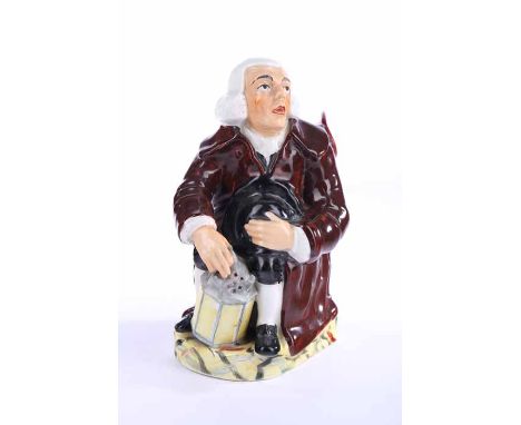 19TH CENTURY STAFFORDSHIRE TOBY JUG
of traditional form, depicting a seated man holding a lantern and his hat, 23cm high