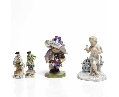GROUP OF FOUR LATE 19TH CENTURY FIGURES 
including a German cherub and bird cage group, 14cm high; along with a figure of a s