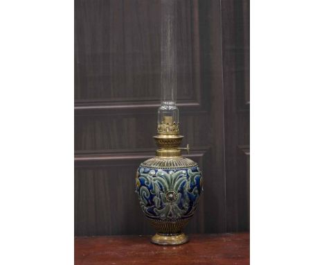 DOULTON LAMBETH OIL LAMP
of oviform, the body with moulded foliate and beaded designs in tones of blue, green and brown, with