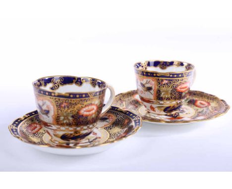 ROYAL CROWN DERBY IMARI TEA SERVICE
date cypher for 1902, red hand-painted numbering to base '6294', comprising twelve cups, 