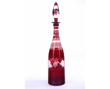 VICTORIAN ETCHED CRANBERRY GLASS DECANTER
with stopper, the neck of the decanter with spiralling designs and decorated with s