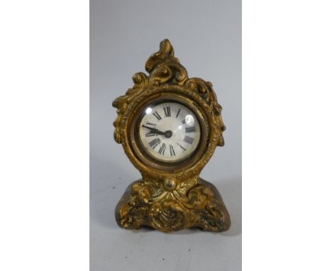 A Gilded Metal Cased Mantle Clock with British Clockwork Movement, 15cm High 