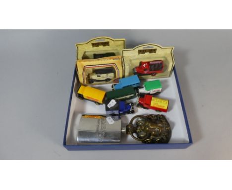 A Tray of Sundries to Include Jameson Hip Flask, Brass Lion Mask Door Knocker and Collection of Diecast Toys