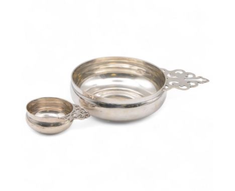 American silver porringer, after the original design by Paul Revere, of circular form with single pierced keyhole pattern han