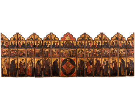 A RUSSIAN PORTABLE ICONOSTASIS, MOSCOW SCHOOL, EARLY 19TH CENTURYEgg tempera, gold leaf, and gesso on wood panel.Extended siz