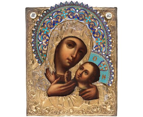 A RUSSIAN ICON OF THE VIRGIN OF TENDERNESS [ELEUSA] IN A GILT SILVER AND CLOISONNE ENAMEL OKLAD, 1857depicting the Virgin and