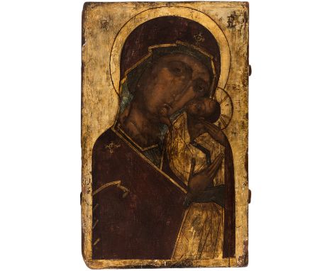 A RUSSIAN ICON OF THE VIRGIN OF TENDERNESS [ELEUSA], LATE 16TH CENTURYdepicting the Virgin and the Child Christ nestled again