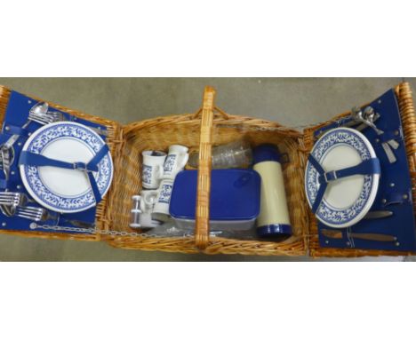 A wicker picnic hamper set 
