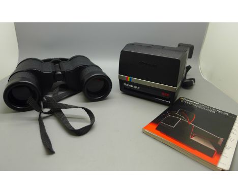 A pair of Russian binoculars and a Polaroid Land Camera 