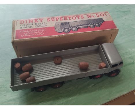 A Dinky Supertoys no.501 Foden diesel eight wheel wagon 1947-52 type one cab, with box and in mild playworn condition, wheel 