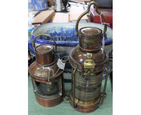 A Victorian copper and brass ship's anchor lamp marked Pascall Atkey &amp; Sons, Cowes, complete with burner, standing 15" hi