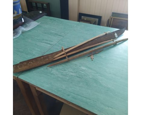 A carved wooden vintage model of an outrigger canoe, possibly Hawaiian (as found), 53" long 