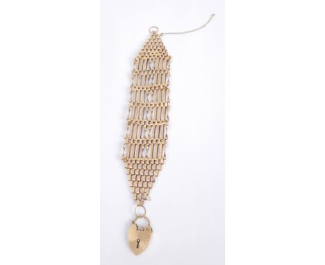Gold gate bracelet A 9ct yellow-gold gate bracelet, with heart-shaped padlock catch. 20g. 