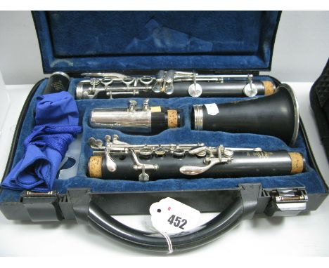 An Ebonised Five Sectional Clarinet, Crampon & Cie Buffet A. Paris, with silvered mounts, in case.