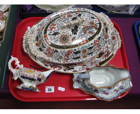 An Ashworth Ironstone Tureen and Cover, similar stand, sauce boat and cream jug:- One Tray