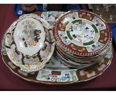 A XIX Century Ashworth Ironstone Meat Plate, tureen and cover and a collection of plates in various patterns.
