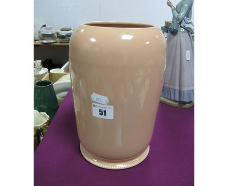 Susie Cooper Pottery Vase, in salmon pink, with ropetwist base, impressed Susie Cooper reference J16?, 23cm tall. 