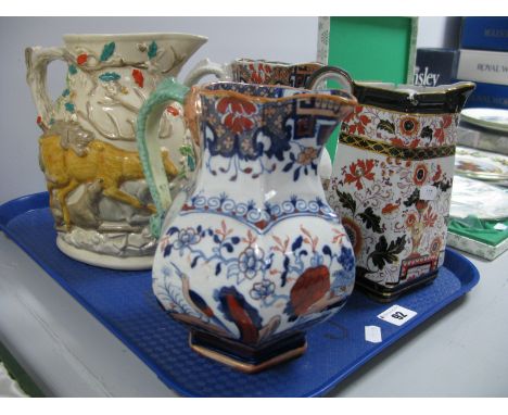 A Mason's 'Yorkshire' Stag and Boar Hunting Relief Moulded Jug, two XIX Masons Hydra jugs, varying design, and a hot water ju