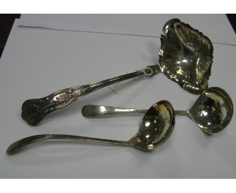 A Pair of Ladles, each of hand hammered finish; together with a twin spout Kings Pattern ladle. (3)