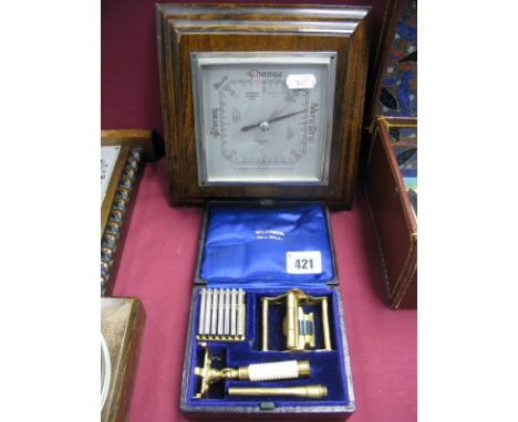 Wilkinson Seven Day Razor Set, featuring seven day of the week blades and brass fittings in morrocco case marked "Wilkinson, 