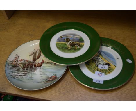 THREE CERAMIC PLATES FEATURING DOGS