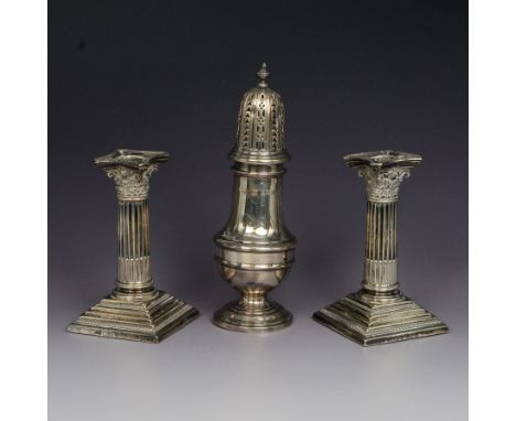 Pair of late Victorian silver dwarf Corinthian column candlesticks, Sheffield 1880, makers marks indistinct, together with a 