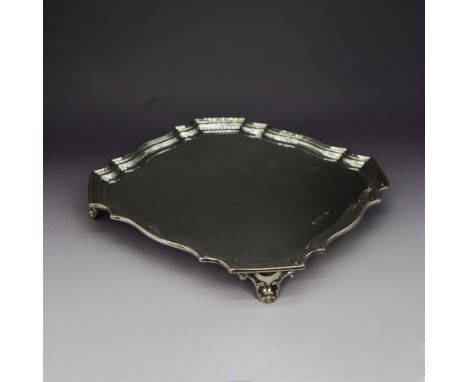 1920s silver waiter, of octagonal form with piecrust rim, upon four Art Nouveau style feet, hallmarked Walker & Hall, Sheffie