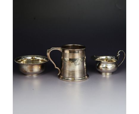 Group of early 20th century silver, comprising christening mug, of tapering cylindrical form with banded decoration, hallmark