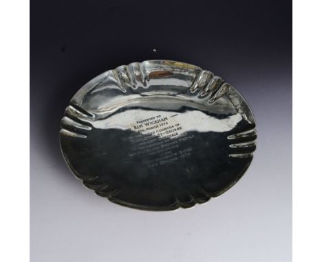 1930s silver presentation dish, of circular form with pleated rim, with later presentation engraving to centre reading 'Prese