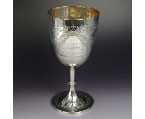 Victorian silver trophy cup, of goblet form the bowl with presentation engraving and foliate decoration, upon knopped stem an
