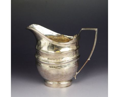 George III provincial silver helmet shaped jug, with engraved decoration and monogram to body, hallmarked Newcastle, no date 