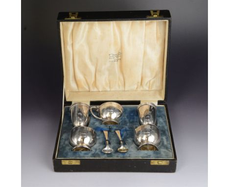 Art Deco silver five piece cruet set, comprising mustard pot, two pepper shakers and two open salts, hallmarked Hukin & Heath
