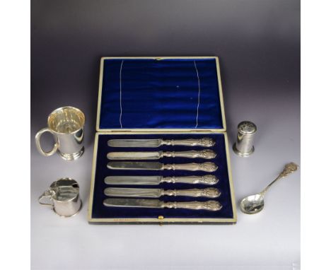 Group of silver, comprising christening mug and Irish silver spoon, both with personal engravings, mustard pot, pepper pot an