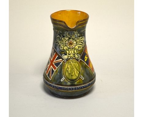 A DOULTON LAMBETH STONEWARE JUG, Commemorating of the Hoisting of the flag at Pretoria', June 5th 1900, relief decoration wit