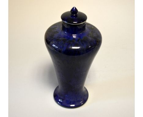 RUSKIN POTTERY, an early 19th Century mottled blue glaze covered vase, designed by William Howson Taylor, scissor painted mar