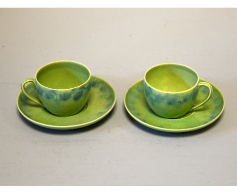 RUSKIN POTTERY, a group of lustre coffee cups, saucers and plates, to include two William Howson Taylor coffee cups and sauce