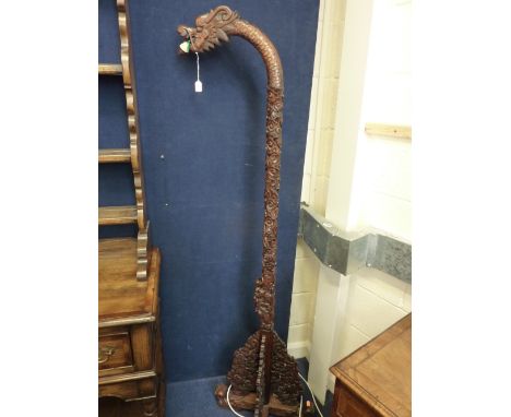 A CHINESE CARVED HARDWOOD STANDARD LAMP, approximate height 177cm