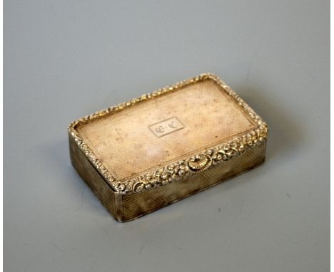 A GEORGE III SILVER SNUFF BOX, engine turned decoration in a floral border, initialled, Charles Rawlings,  London 1781, appro