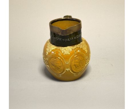 A DOULTON LAMBETH STONEWARE JUG, Commemorating Queen Victoria, with portrait medallions in a tube lined banner 'She Wrought H