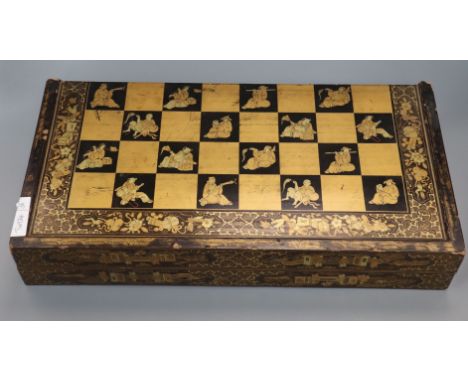 An Oriental lacquered chess/backgammon board